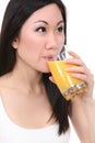 Asian Woman Drinking Orange Juice Royalty Free Stock Photo