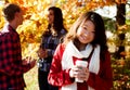 Asian woman drinking a warm drink Royalty Free Stock Photo