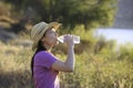 Asian Woman Drinking Water Outdoor