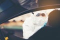 Asian Woman Drive Thru Covid-19 Testing With PPE Medical Staff, COVID testing temp while checking in cars Royalty Free Stock Photo