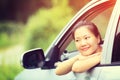 Asian woman driver driving a car Royalty Free Stock Photo