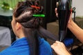 Asian Woman Drying Customer Hair with Shampoo in the Hairdresser Beauty Salon Royalty Free Stock Photo