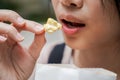 Asian woman easting popcorn full hand closed up Royalty Free Stock Photo