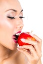 Asian woman eating apple Royalty Free Stock Photo