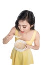 Asian woman eating bowl of cereal or muesli for breakfast Royalty Free Stock Photo