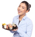 Asian woman eating sushi. Shallow depth of field, focu Royalty Free Stock Photo