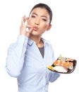 Asian woman eating sushi. Shallow depth of field, focu