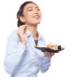 Asian woman eating sushi. Shallow depth of field, focu