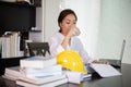 Asian women engineer are drinking water and working at office Royalty Free Stock Photo