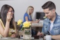 Asian woman and european man having coffee break Royalty Free Stock Photo