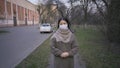 Asian woman In face mask Standing Alone Outdoor