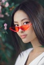 Asian woman fashion close-up portrait outdoors Royalty Free Stock Photo