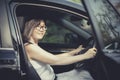 Asian woman fasten car seat belt before take a driving Royalty Free Stock Photo