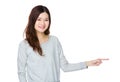 Asian woman with finger point aside Royalty Free Stock Photo