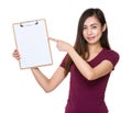 Asian woman finger point to clipboard Royalty Free Stock Photo