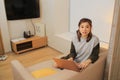 Asian woman forget somthing when she work at home by laptop Royalty Free Stock Photo