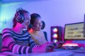 Asian woman gamer play online game with joystick and computer Royalty Free Stock Photo