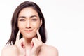 Asian woman get soft moist skin face by touching beauty face. Attractive beautiful young girl get happy, smiley face and satisfied Royalty Free Stock Photo