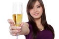 Asian woman give champagne toast, on white