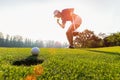 Asian woman golfer action to win after long putting golf ball on the green golf, sunset time, Royalty Free Stock Photo