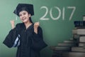 Asian woman graduate with 2017 number