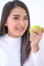 Asian woman with green apple Royalty Free Stock Photo