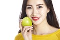 Asian woman with green apple Royalty Free Stock Photo