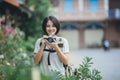 Asian woman group backpacker take a photo with friends. Royalty Free Stock Photo