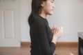 Asian woman with hand in praying worship position,Female prayer hands clasped together Royalty Free Stock Photo