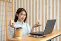 Asian woman hands holding paper house, business and property concept Royalty Free Stock Photo