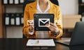 Woman hands using Laptop, tablet typing on keyboard and surfing the internet with email icon, email marketing concept, send e-mail Royalty Free Stock Photo