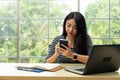 Asian woman hands using stylus pen writing on personnal pda to check information Royalty Free Stock Photo