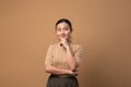 Asian woman happy confident on beige background