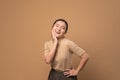 Asian woman happy confident on beige background