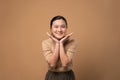 Asian woman happy confident on beige background