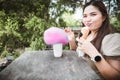 woman happy young eats ice cream