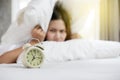 Asian woman hates waking up early in the morning. Sleepy girl lo Royalty Free Stock Photo