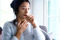 Asian women have angina, high fever and chronic cough