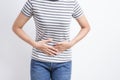 Asian woman having stomachache on white background