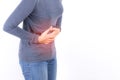 Asian woman having stomachache on white background