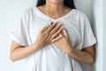 Woman having or symptomatic reflux acids,Gastroesophageal reflux disease