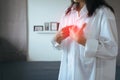 Asian woman having or symptomatic reflux acids,Gastroesophageal reflux disease,Because the esophageal sphincter that separates the Royalty Free Stock Photo