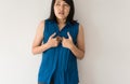 Asian woman having or symptomatic reflux acids,Gastroesophageal reflux disease Royalty Free Stock Photo