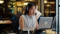 Asian woman working in call center office Royalty Free Stock Photo