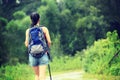 Asian woman hiking at beautiful trail