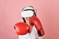 Asian woman hitting a punch by vr glasses, Working out with boxing video games application from virtual reality headset