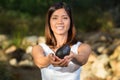 Asian woman holding avocado Royalty Free Stock Photo