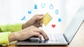 Asian Woman holding bank business credit card with computer laptop, Woman hand holding bank credit card, Paying using credit card Royalty Free Stock Photo