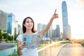 Asian woman holding city map