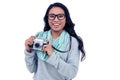 Asian woman holding digital camera Royalty Free Stock Photo